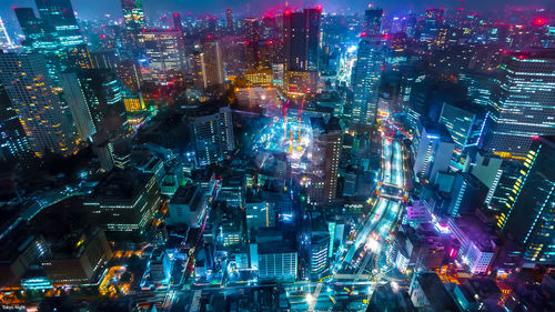 High angle view of illuminated cityscape at night,tokyo,japan