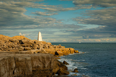 The trinity house obelisk or the trinity house landmark at portland bill, isle of portland, uk.