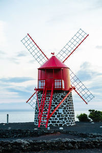 Traditional windmill  against sky