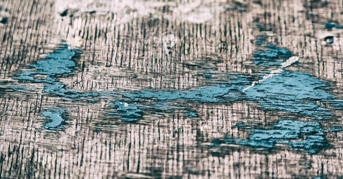 Full frame shot of weathered wooden table