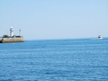 Scenic view of sea against clear sky