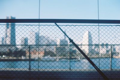 Chainlink fence against clear sky