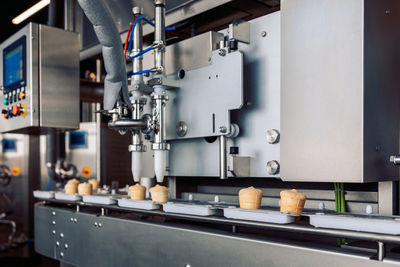 Manufacturin for automatic production of ice cream cones. conveyor belt in waffle cups, creme 
