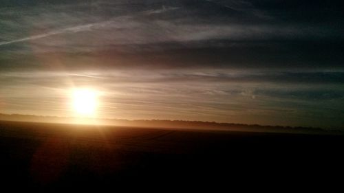 Scenic view of landscape at sunset