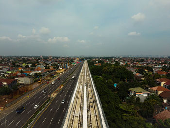 High angle view of road amidst buildings in city