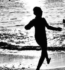 Reflection of woman in water