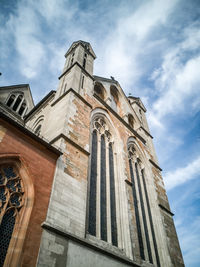Low angle view of old building against sky