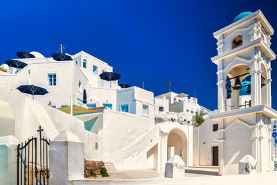 Low angle view of church against blue sky