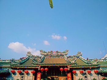 Low angle view of built structure against blue sky