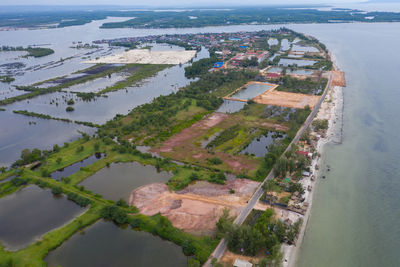 High angle view of river amidst buildings in city