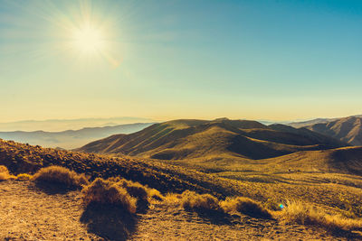 Scenic view of mountains against sky during sunset