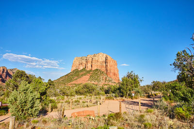 Scenic view of mountains against clear blue sky