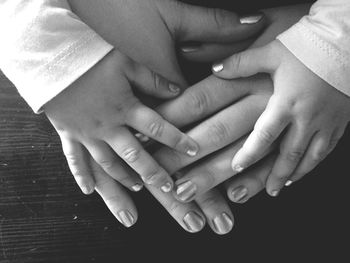 Close-up of baby hand holding baby