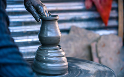 Close-up of man working at workshop