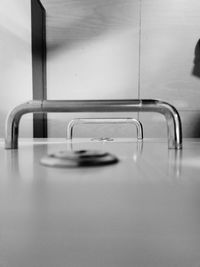Close-up of empty glasses on table