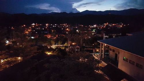 Illuminated cityscape at night