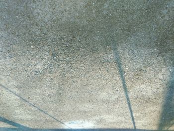 High angle view of shadow on floor