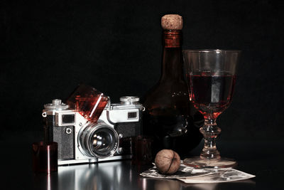 Close-up of wine bottles on table