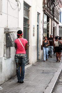 Woman standing in front of building