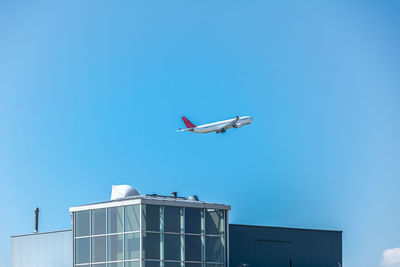 Low angle view of airplane flying