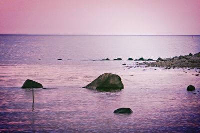 Scenic view of sea at sunset