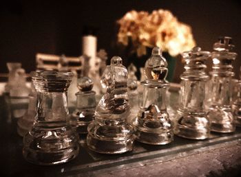 Close-up of chess pieces on table