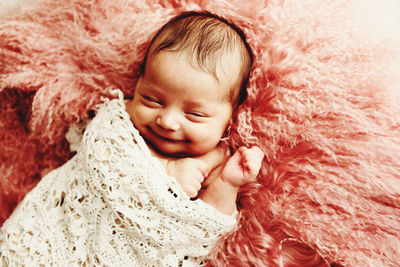 Cute baby sleeping on bed