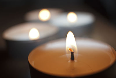 Close-up of illuminated candle