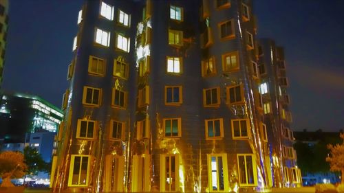 Low angle view of building at night