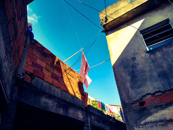 Low angle view of multi colored buildings against sky