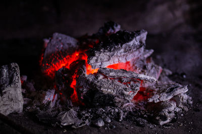 Close-up of bonfire on wood