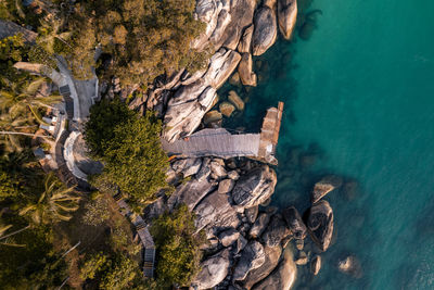 High angle view of rocks in sea