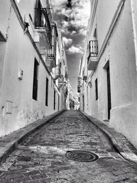 Narrow alley along buildings