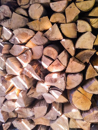 Full frame shot of logs in forest