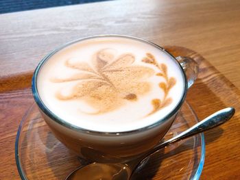 High angle view of cappuccino on table