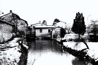 View of canal along buildings