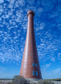 Low angle view of building against blue sky