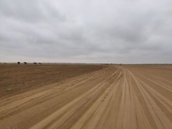 Scenic view of land against sky and desert view