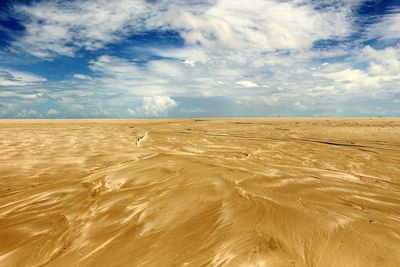 Scenic view of desert against sky