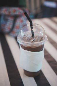 Close-up of coffee cup on table