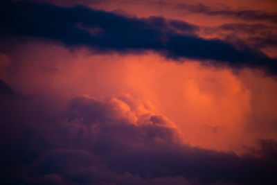 Low angle view of clouds in sky during sunset