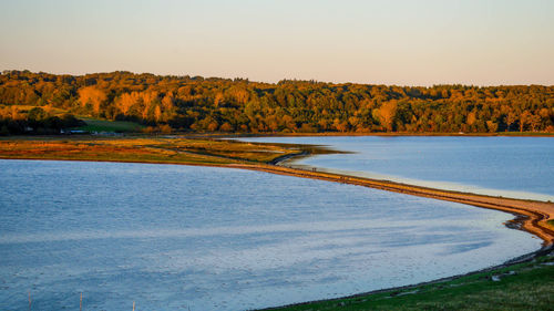 Scenic view of lake against clear sky