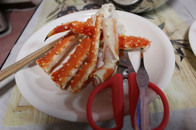 High angle view of crab in plate on table