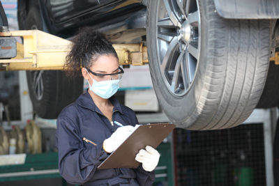 Portrait of young woman working