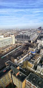High angle view of buildings in city against sky