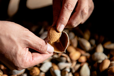 Close-up of man preparing food