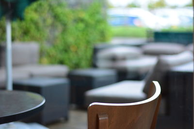 Close-up of empty chair on table