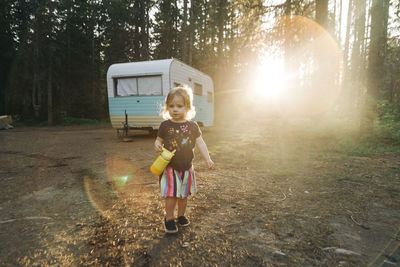 A young girl walks at a campsite near mt. hood, oregon.