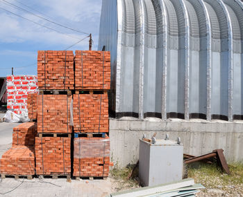 Stack of industrial building against sky