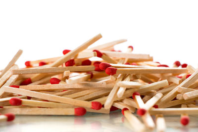 Close-up of food on table against white background